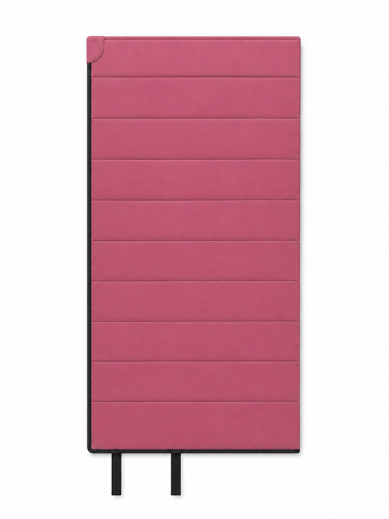 Front of the junior pink organic cotton sleeping bag with two black tie straps