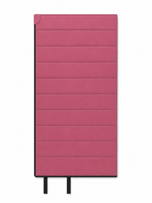 Front of the junior pink organic cotton sleeping bag with two black tie straps